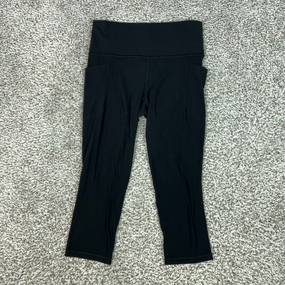 Athleta Leggings Womens Medium Black Salutation Stash Pocket Capri Yoga Pants